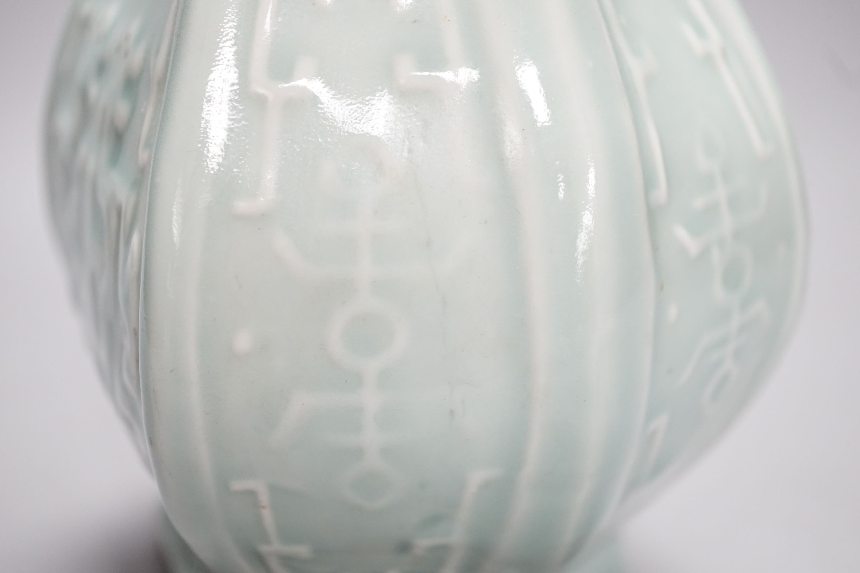 A Chinese archaistic celadon glazed vase, Republic period, height 27.5cm